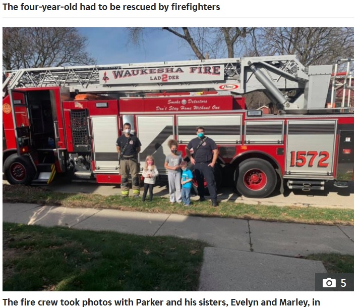 最後は隊員たちと記念撮影（画像は『The Sun　2020年11月20日付「TOT IN A TREE Boy stuck in cat scratch-post tree had to be rescued by firefighters」』のスクリーンショット）