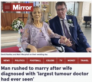 結婚式でのマイリさんとデヴィッドさん（画像は『The Mirror　2022年4月24日付「Man rushed to marry after wife diagnosed with ‘largest tumour doctor had ever seen’」』のスクリーンショット）