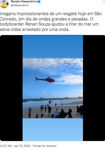 ヘリコプターで砂浜に運ばれた2人（画像は『Renato Alexandrino　2022年4月16日付Twitter「Imagens impressionantes de um resgate hoje em São Conrado」』のスクリーンショット）