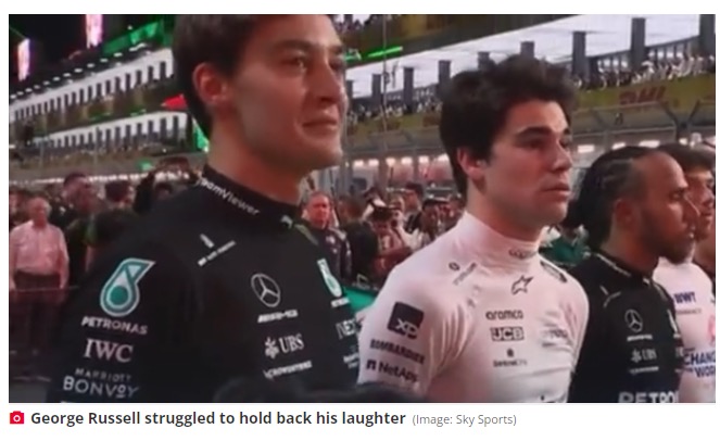 笑いをこらえるF1ドライバー（画像は『The Daily Star　2023年3月19日付「‘Horrific’ Saudi anthem played so badly that F1 drivers have to hold back laughter」（Image: Sky Sports）』のスクリーンショット）